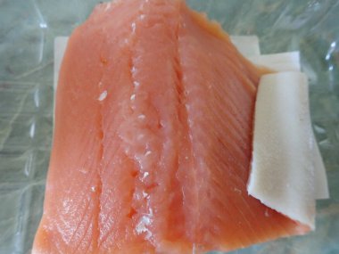 raw salmoun fillet ready to cook  in kitchen
