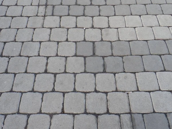 detail of a street concrete cobble tiles  pattern