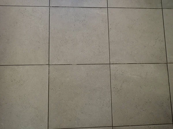detail of white floor tile pattern indoor