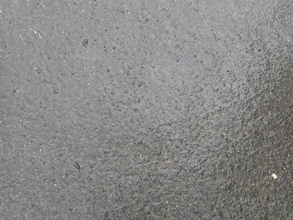 Detail Van Waterdruppels Spatten Een Nat Oppervlak — Stockfoto