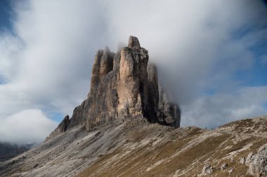 batutiful autumn nature in famous rocky dolomites mountains clipart