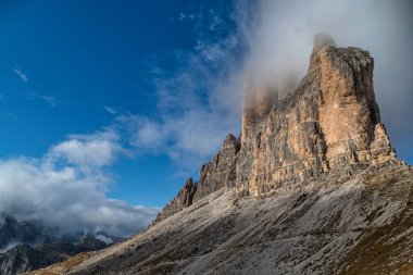 batutiful autumn nature in famous rocky dolomites mountains clipart