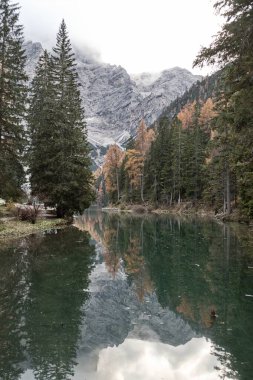 batutiful autumn nature in famous rocky dolomites mountains clipart