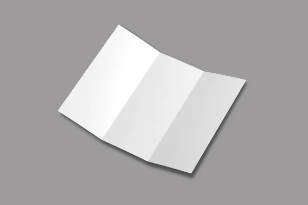 灰色の背景で隔離された白い三重折目のペーパー — ストック写真