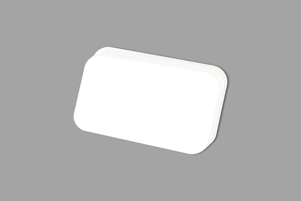灰色の背景の空白のペーパー名刺 — ストック写真