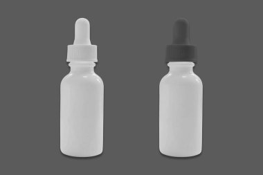 İzole edilmiş gri arkaplandaki damlalık şişesi