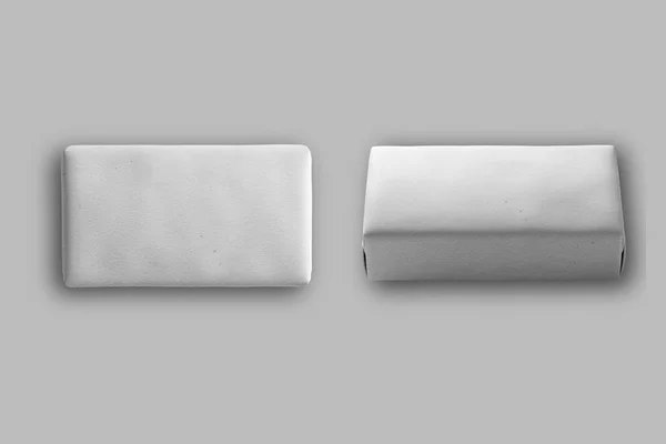 背景に隔離された白いラップ状の長方形の石鹸モックアップのトップビュー 3Dレンダリング — ストック写真