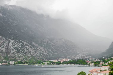 Fog over Boko Kotor Bay in Montenegro stock photo