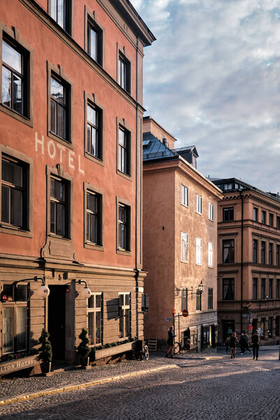 Stockholm, Sweden - Sept 2022: Traditional architecture of old houses and a hotel facade near Storkyrkan in Gamla Stan
