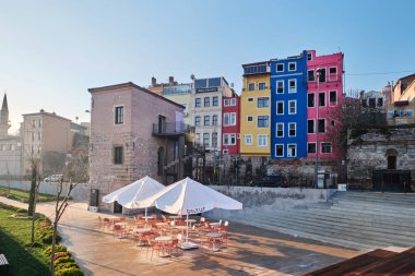 Istanbul, Turkey - January, 2023: Halic Sanat exhibition house from IBB and Colorful houses in Balat district and historic streets in Goldenhorn clipart