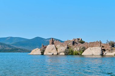 Bafa, Turkey - July 15, 2023: The monastery church of Ancient city of Latmos Herakleia on an island in Bafa lake