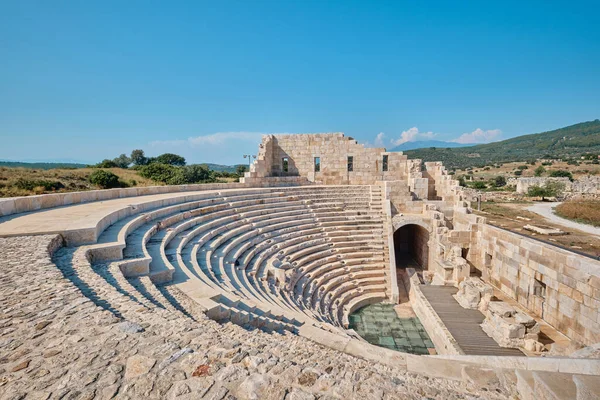 Antalya, Turkey - July 19, 2023: Ruins of the ancient Lycian city Patara. Theatre and the Assembly hall of Lycia public. Patara was at the Lycia (Lycian) League\'s capital.