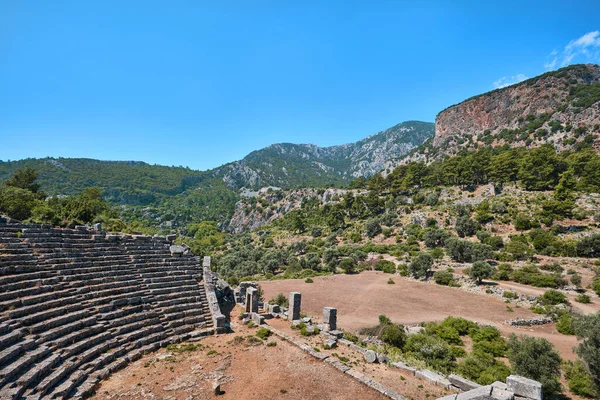 Mugla, Türkiye - 19 Temmuz 2023: Antik Pinara kentinde tiyatro
