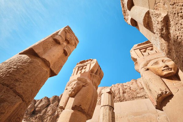 Luxor, Egypt - December 26 2023: Mortuary Temple of Queen Hatshepsut, Hathor column heads