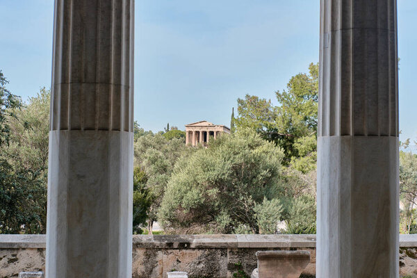 Athens, Greece - March 03, 2024: Temple of Hephaestus in Ancient Agora view from stoa of Attalos
