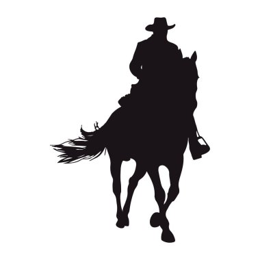 Kovboy silueti tek başına ayakta duruyor.