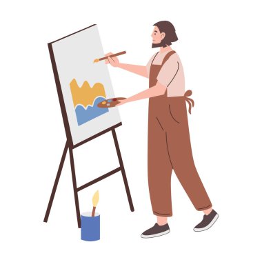 Resim öğretmeni fırça kullanarak tuvale resim yapıyor.