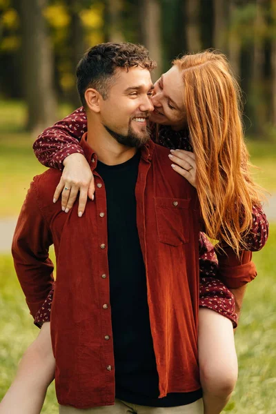 stock image In love couple having fun together outdoor in park at sunset, enjoying each other