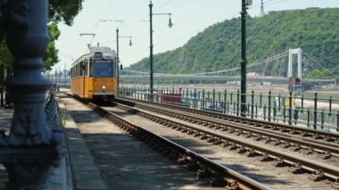 Hungary- Budapest, 17 June 2022- Video of the tram passes near the camera in city.