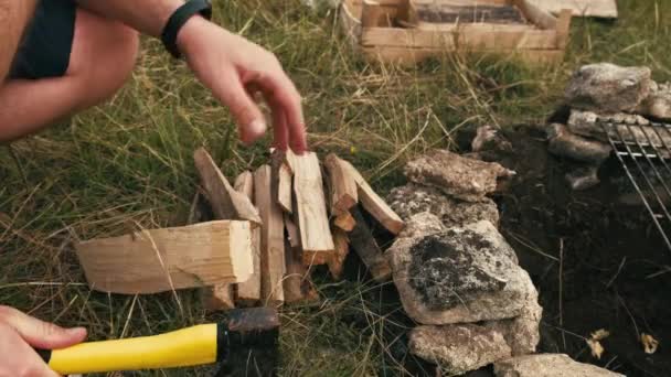 Man Chopping Wood Axe Fire Camp Bbq — Stock Video