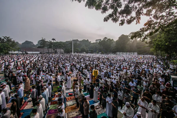 stock image Muslim community carry out the Eid prayer 1444 H on April 21, 2023 at Sempur Field, Bogor, West Java, Indonesia