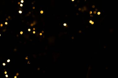 Siyah arkaplanda bokeh ışıkları