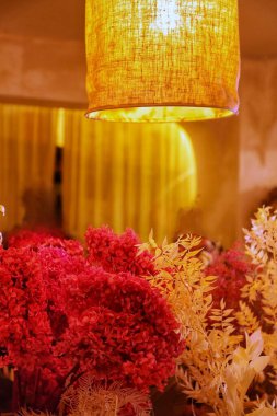 a bouquet of flowers and candles