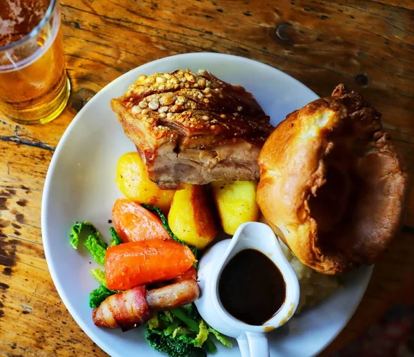 grilled chicken with potatoes and vegetables. Sunday roast