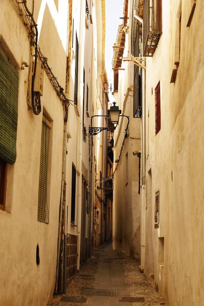 Narrow alley in a street of medieval streets un granada,spain