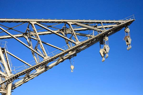 crane and construction against the blue sky