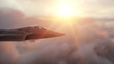 Askeri savaş uçağı F-22 bulutların üzerinde uçuyor. Hava Kuvvetleri