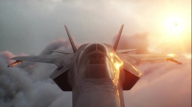 Askeri savaş uçağı F-35 bulutların üzerinde uçuyor. Hava Kuvvetleri