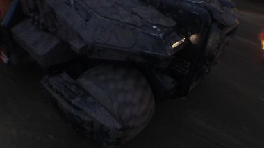 Kıyametçi savaş makinesi yanan bir şehrin içinden geçiyor.