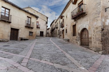 Typical street in the historic center of Pedraza. Segovia. Spain