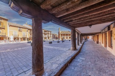 Porticos of the main square of Ayllon in Segovia. Spain