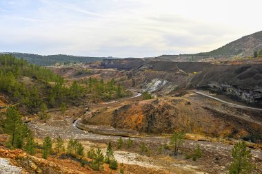 Overlooking the historic mining landscape of Rio Tinto with its winding river and contrast of barren and vegetated land