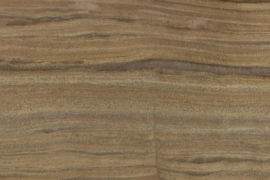 Detailed close-up of a weathered sandstone rock formation showcasing natural textures and layers. Ideal for backgrounds, nature themes, and geological studies