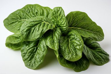 Vibrant green fresh spinach leaves, displayed on a white background. clipart