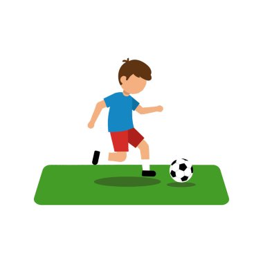 Çocuk futbol topunu tekmelerken ileri gidiyor..