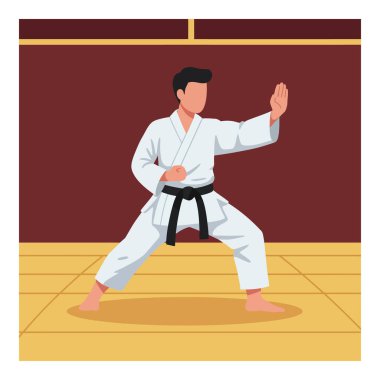 Dövüş sanatları pratisyeni, kapalı mekanda beyaz bir giyle ve siyah kuşakla odaklanmış bir karate duruşu sergiler. Ortam disiplinli..