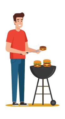 Adam açık havada mangal mangalında hamburgerler pişiriyor. Rahat bir atmosferde yaz tatili aktivitelerinin tadını çıkarıyor..