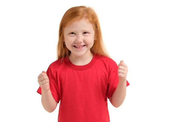 Весела Маленька Дівчинка Виглядає Схвильовано Вона Піднімає Кулаки Ізольована Білому — стокове фото