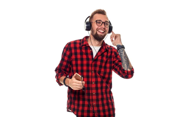 Joven Hombre Hipster Con Camisa Cuadros Gafas Con Auriculares Que — Foto de Stock