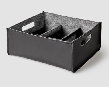 Stylish handmade black leather box-organizer lined with gray felt inside with internal dividers and handles for storing things at home and in office