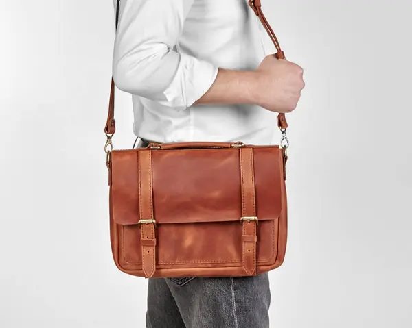 Man White Shirt Jeans Carrying Comfortable Copper Colored Leather Messenger — Stock Photo, Image