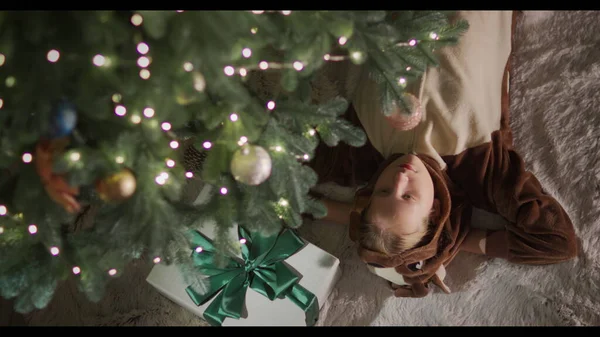 Child Deer Costume Lies Beautiful Christmas Tree Next Box Gift — Stock Photo, Image