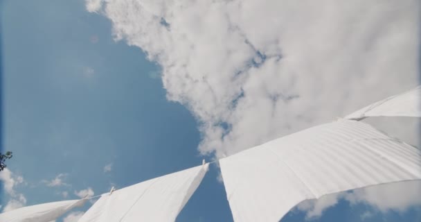 White Bedding Drying Blue Sky — Stockvideo