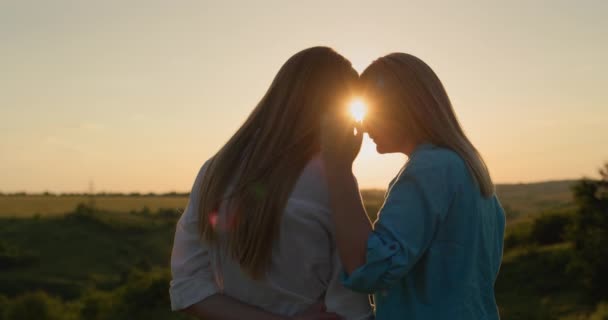 Profile Woman Teenage Daughter Standing Sunset Mother Gently Touches Child — Stock Video