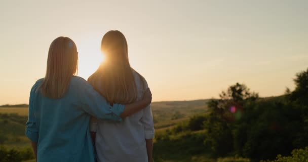 Woman Hugs Her Teenage Daughter Together Watch Sun Picturesque Valley — Stock Video