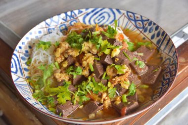 Rice noodles with spicy pork sauce. Local food of Thai in the north of Thailand.